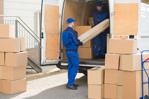 Student removal van and boxes prepared for a move in Hampstead