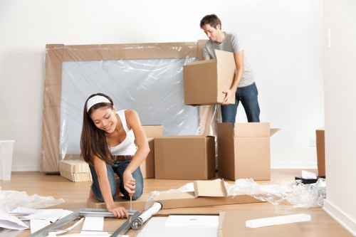 Moving boxes and furniture arranged for house removals in Hampstead
