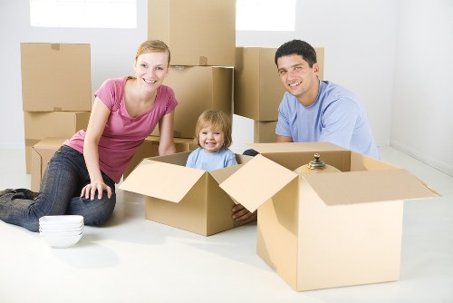 Packed moving boxes and furniture ready for a Hampstead removal