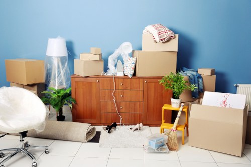 Moving team handling a booked relocation service with care