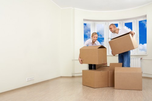 Furniture and household items being loaded into a moving van