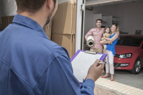 Local movers handling household items carefully during a Hampstead relocation