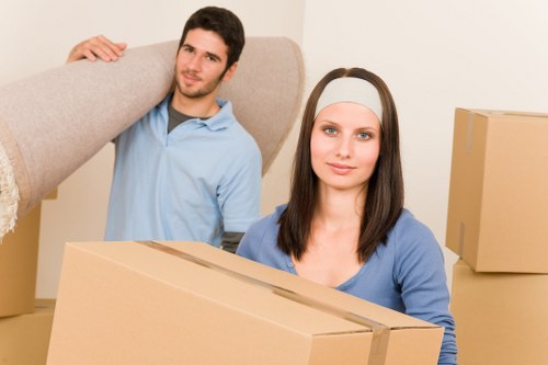 Careful packing of office equipment during a Hampstead relocation