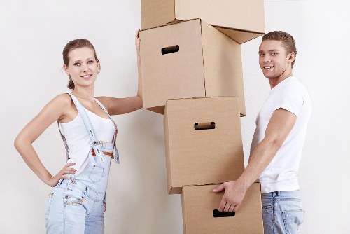 Packed boxes and furniture prepared for flat removals in a Hampstead apartment
