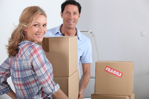 Professional movers handling office furniture in Hampstead