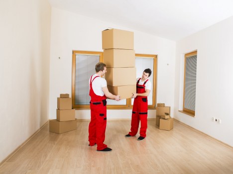 Navigating stairs and narrow hallways during a Hampstead flat relocation
